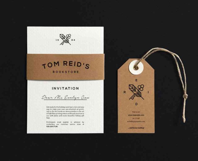 A brown paper tag and a white card