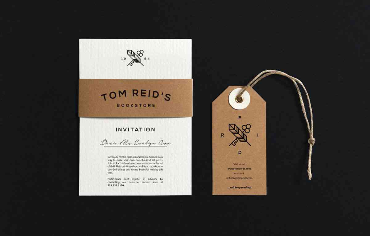 A brown paper tag and a white card